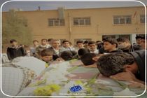 مراسم استقبال و وداع با پیکر شهید گمنام دوران دفاع مقدس در دبیرستان پسرانه شهید نصیری یزد