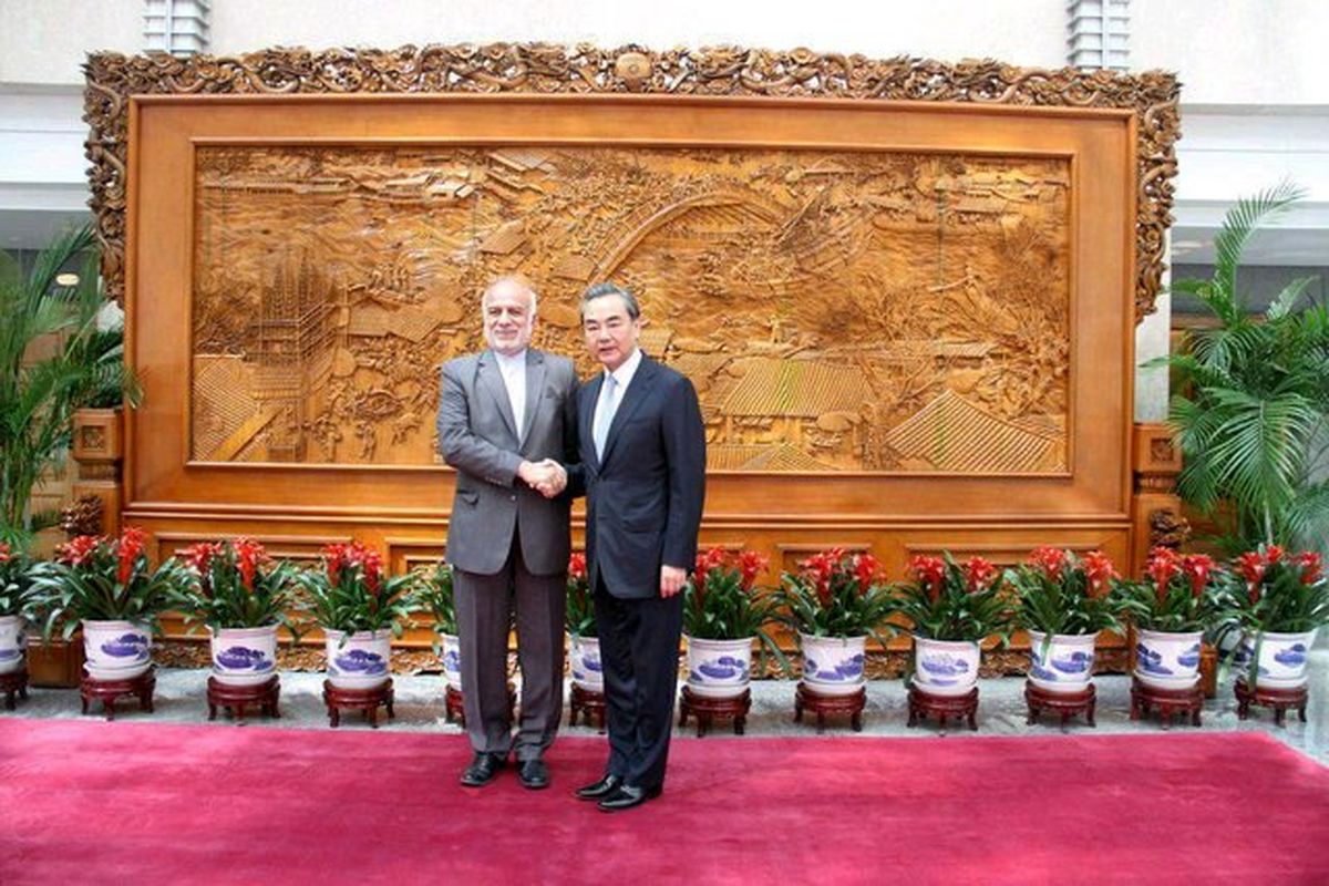 دیدار معاون ظریف با وزیر امور خارجه چین در پکن