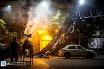 بزرگترین پرچم عزای حسینی کشور در پایتخت برافراشته شد