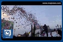 آزاد کردن هزاران بادکنک رنگی در میدان انقلاب در جشن کیلومتری غدیر + فیلم