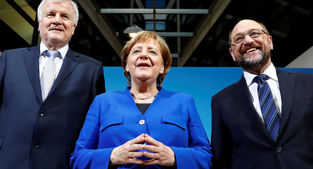 پایان بن بست سیاسی در آلمان؛ توافق مرکل با سوسیال دموکرات ها برای تشکیل دولت ائتلافی 