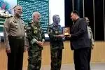 نشان فداکاری ارتش به پنج خانواده شهید اهدا شد