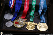 اهدای ۵ قهرمان وزنه‌برداری مدال‌های خود را به موزه آستان قم