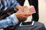 کاهش جزئی قیمت دینار عراق در آستانه سفرهای اربعین