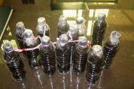 کشف تریاک در بطری های آب معدنی / 2 قاچاقچی مواد مخدر دستگیر شدند